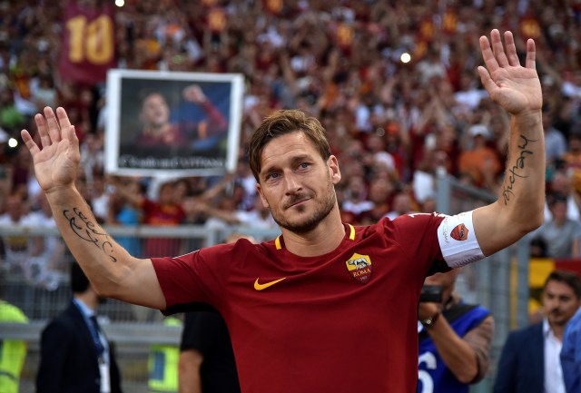 Totti selamanya buat Roma. Foto: Reuters