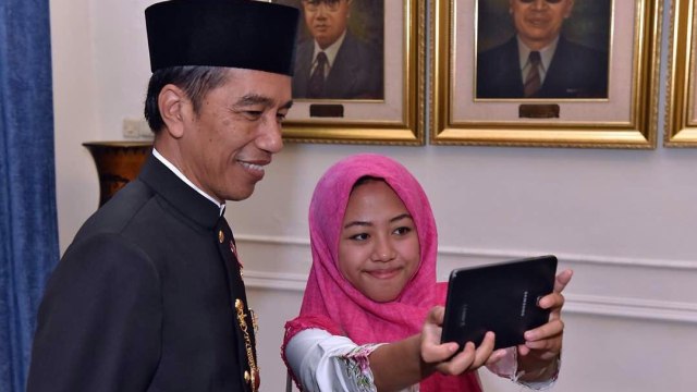 Presiden Jokowi dan Afi Nihaya (Foto: Agus Suparto/Fotografer Kepresidenan)