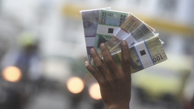 Penukaran jasa uang baru (Foto:  ANTARA FOTO/Zabur Karuru)