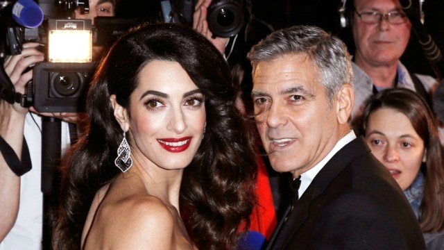 George Clooney dan istrinya, Amal Clooney (Foto: Reuters/Gonzalo Fuentes)