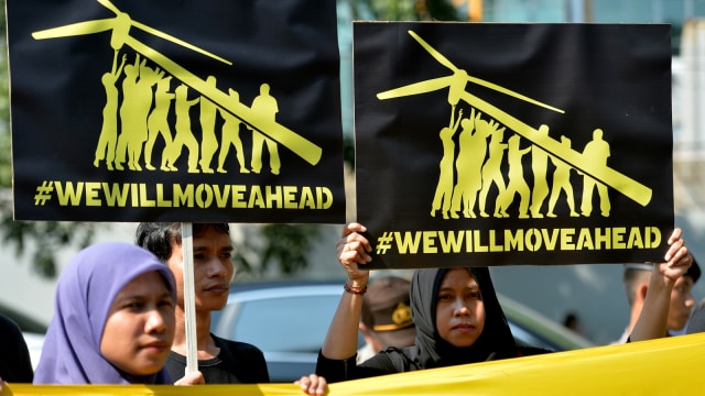 Aktivis Greenpeace protes Trump (Foto: Antara/Widodo S Jusuf)