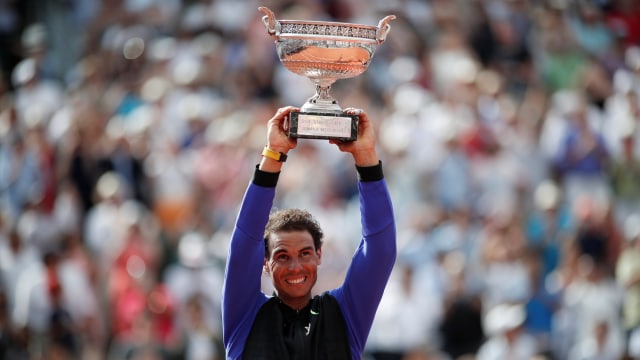 Gelar Grand Slam ke 10 Nadal. (Foto: REUTERS/Benoit Tessier)