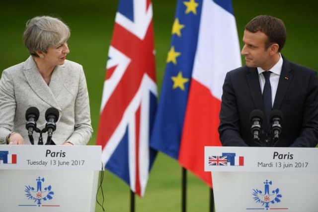 Prancis Sokong Rencana Theresa May Ambil Tindakan Keras pada Perusahaan IT
