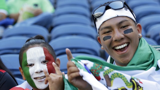 Pendukung sepak bola Meksiko. (Foto: AP Photo/Ted S. Warren)