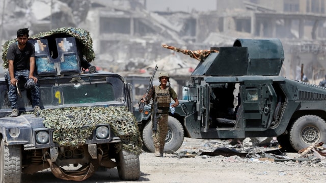 Perang Melawan ISIS di Mosul. (Foto: REUTERS/Ahmed Saad)