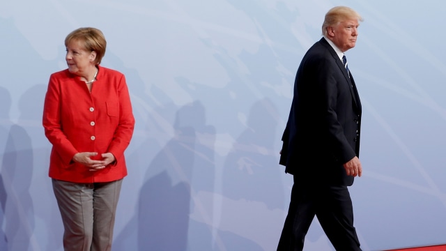 Angela Merkel dan Donald Trump di KTT G20 (Foto: REUTERS/Ian Langsdon)