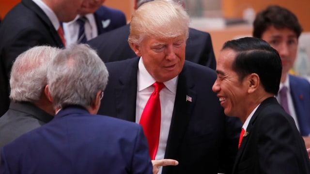 Jokowi dan Trump di KTT G20 (Foto: REUTERS/Wolfgang Rattay)