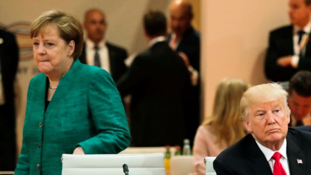 Donald Trump dan Angela Merkel di KTT G20 (Foto: REUTERS/Markus Schreiber)