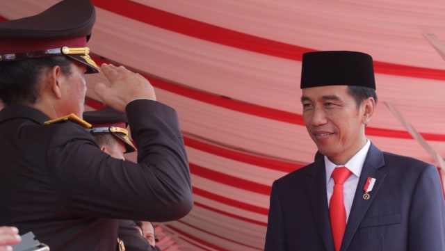 Jokowi di HUT Bhayangkara (Foto: Fanny Kusumawardhani/kumparan)