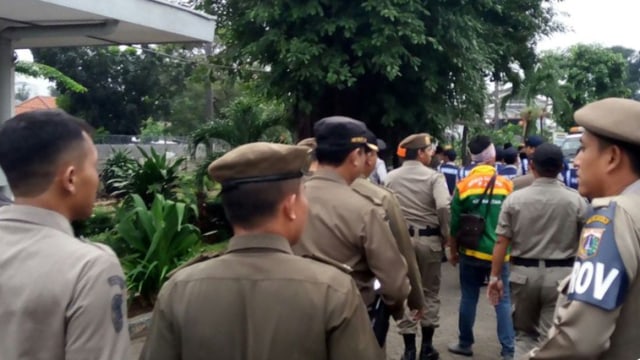 Apel aparat sebelum penertiban di Bukit Duri. (Foto: Ferio Pristiawan/kumparan)