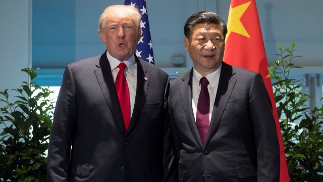 Donald Trump dan Xi Jinping di KTT G20 Foto: REUTERS/Saul Loeb