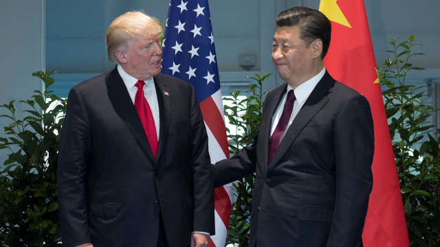 Donald Trump dan Xi Jinping di KTT G20 Foto: REUTERS/Saul Loeb