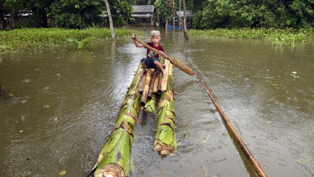 Banjir di India (Foto: Reuters/Anuwar Hazarika)