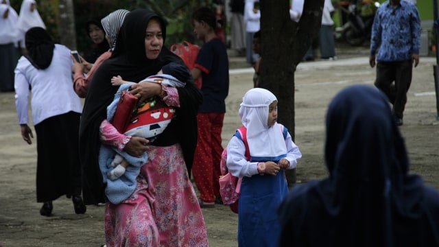 Hari Pertama Sekolah. (Foto: Antara/Jojon)