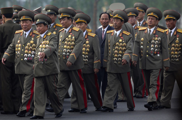 Lencana tentara Korea Utara (Foto: Jason Lee/Reuters)