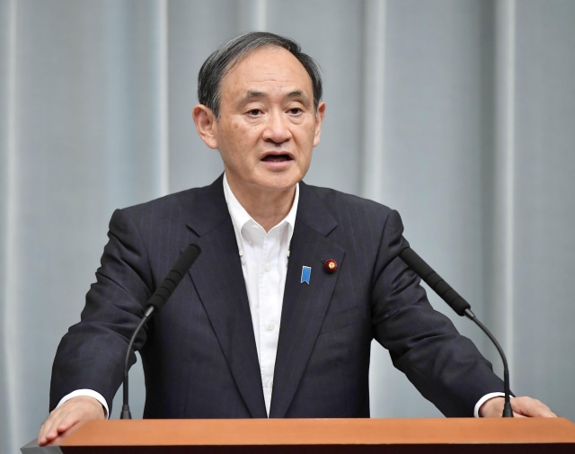 Yoshihide Suga, sekretaris kabinet Jepang. Foto: Kyodo/Reuters