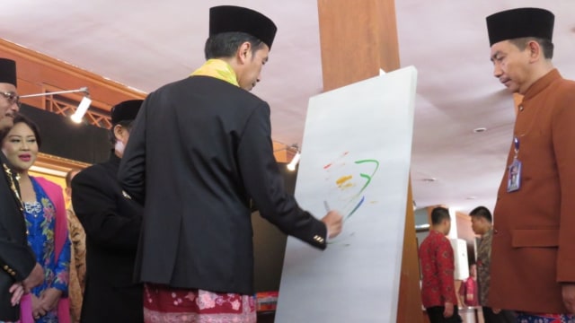 Lukisan Presiden Jokowi di Setu Babakan (Foto: Lukisan Presiden Jokowi di Setu Babakan)