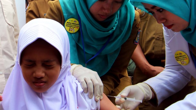 Imunisasi campak-rubella (MR) (Foto: ANTARA FOTO/Muhammad Iqbal)