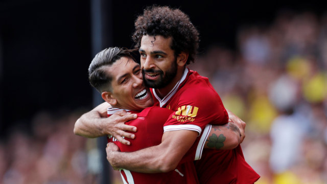 Roberto Firmino dan Mohamed Salah. (Foto: Reuters/Andrew Couldridge)