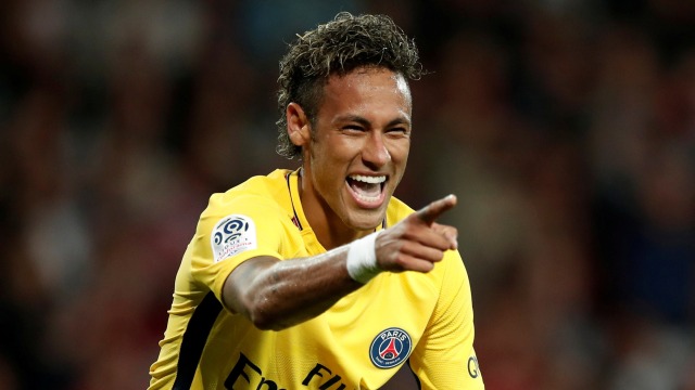 Neymar merayakan gol di debutnya. (Foto: Reuters/Benoit Tissier)