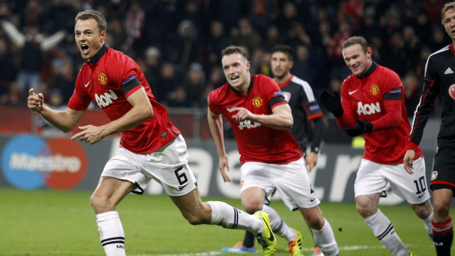 Jonny Evans (kiri) di Manchester United. (Foto: Reuters)