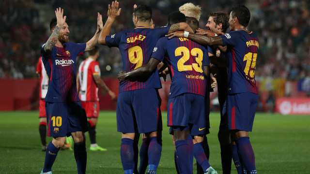Pemain Barcelona merayakan kemenangan atas Girona. (Foto: REUTERS/Albert Gea)