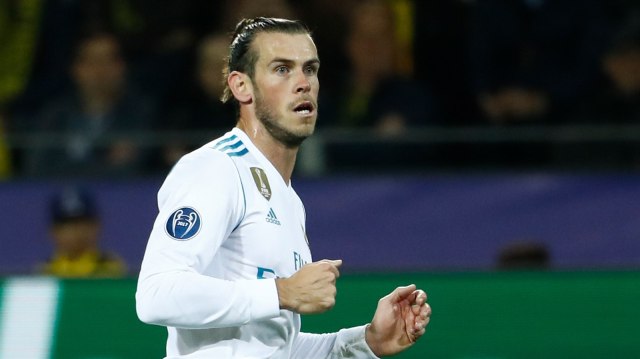 Bale absen bela Madrid di Liga Champions. (Foto: Odd Andersn/AFP)