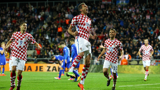 Mandzukic merayakan gol ke gawang Finlandia. (Foto: Reuters/Antonio Bronic)