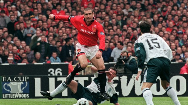 United vs Liverpool di tahun 1996. (Foto: Gerry Penny/AFP)