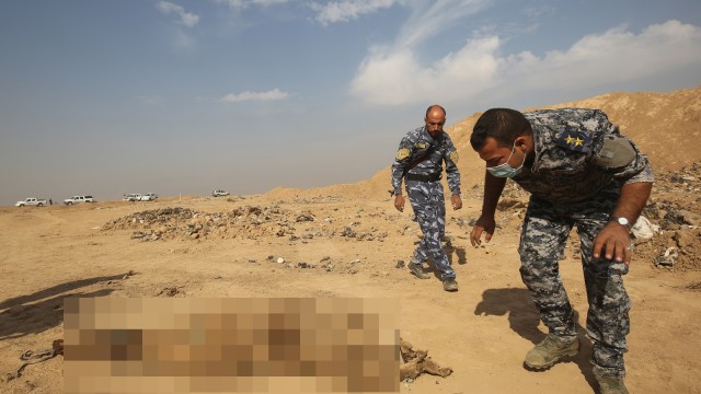 Kuburan masal Iraq (Foto: AHMAD AL-RUBAYE / AFP)