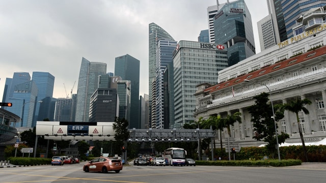 Singapura larang penggunaan mobil (Foto: ROSLAN RAHMAN / AFP)