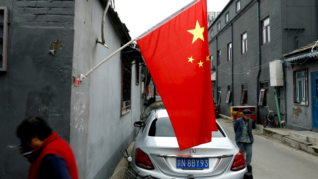 Bendera China (Foto: REUTERS/Tyrone Siu)