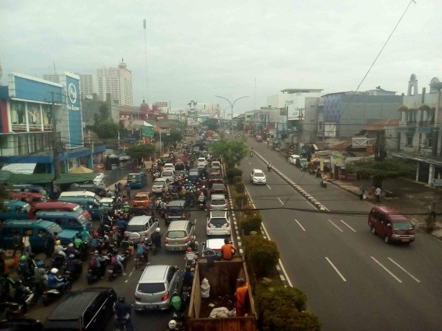 Meski Tersendat di Beberapa Titik, Jalan Raya Margonda Ramai Lancar (2)