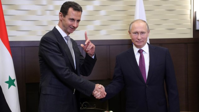 Vladimir Putin dan Bashar al-Assad (Foto: AFP/Mikhail Klimentyev/Sputnik)