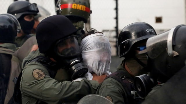 Unjuk rasa pemerintah Venezuela (Foto: REUTERS/Carlos Garcia Rawlins)