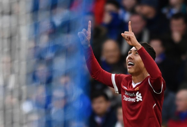 Firmino merayakan golnya untuk Liverpool. (Foto: REUTERS/Dylan Martinez )