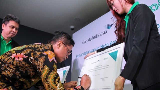Kerja sama Garuda Indonesia dan Grab. (Foto: Grab)