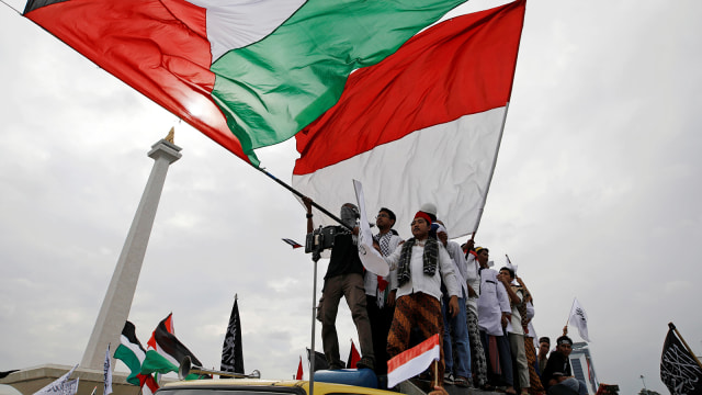 Aksi bela Palestina (Foto: Reuters/Darren Whiteside)