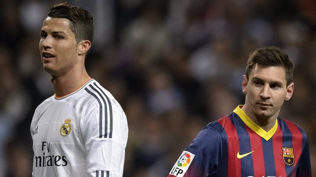 Ronaldo dan Messi dalam El Clasico. (Foto: DANI POZO / AFP)