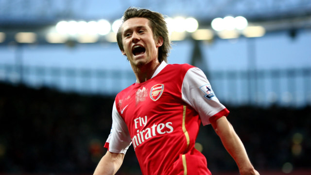 Tomas Rosicky gantung sepatu. (Foto: AFP/Chris Young)