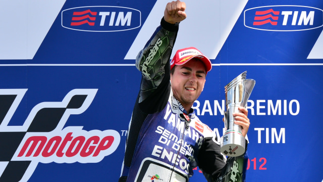 Lorenzo juara MotoGP 2010. (Foto: GIUSEPPE CACACE / AFP)