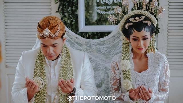 Akad nikah Ardina - Arie. (Foto: Dok.Thepotomoto)