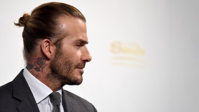 Gaya rambut David Beckham (Foto: AFP/ Toru Yamanaka)
