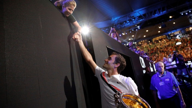 Federer dan istrinya, Mirka. (Foto: REUTERS/Thomas Peter)