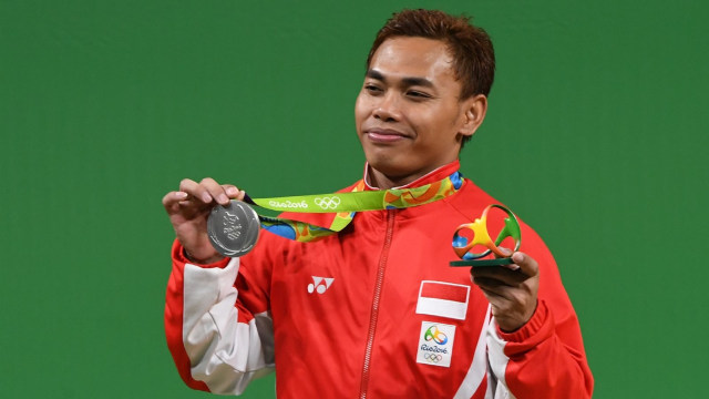 Eko dan medali perak Olimpiade Rio 2016. (Foto: AFP/Goh Chai Hin)