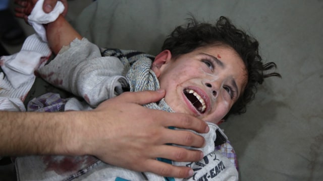 Tragedi Ghouta (Foto: AFP/Ammar SULEIMAN)
