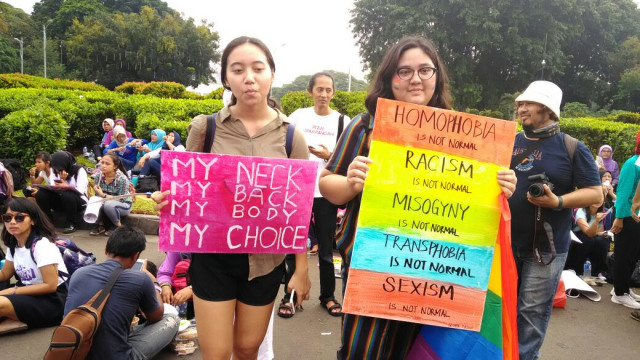 Aksi Women's March di Taman Aspirasi Monas (Foto: Yuana Fatwalloh/kumparan)