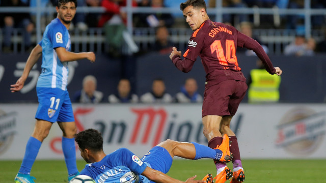 Aksi Coutinho di laga melawan Malaga. (Foto: Reuters/Jon Nazca)