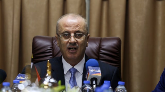 PM Palestina Rami Hamdallah (Foto:  AFP/Pool/Mohammed Abed)