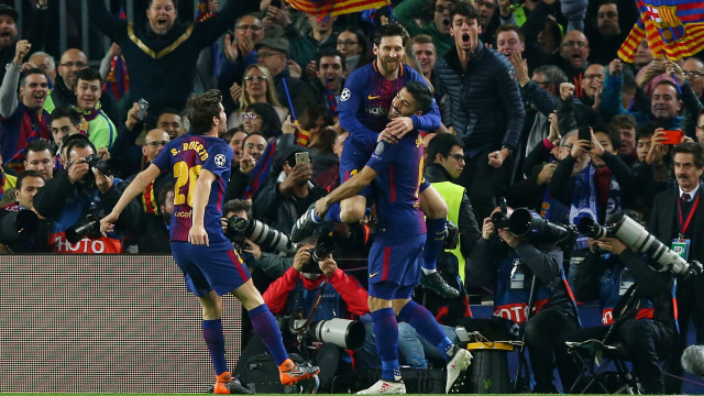 Selebrasi gol Messi ke gawang Chelsea.   (Foto: REUTERS/Albert Gea)